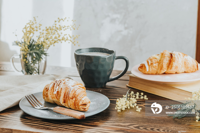 Continental traditional breakfast with croissants and coffee