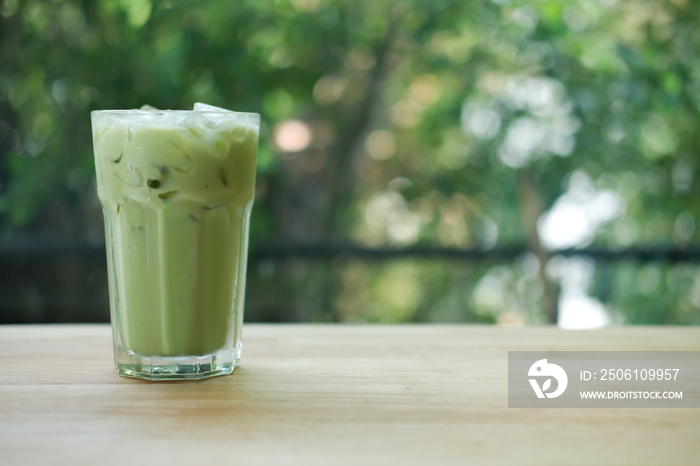 Iced green tea in glass with ice