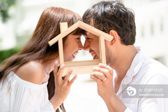 Young couple planning to buy a house concept.