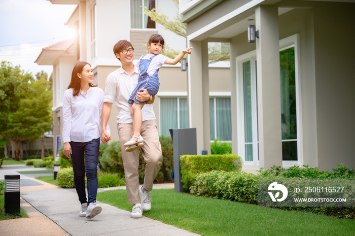 family walking on the model new house looking for living life future, new family meet new house