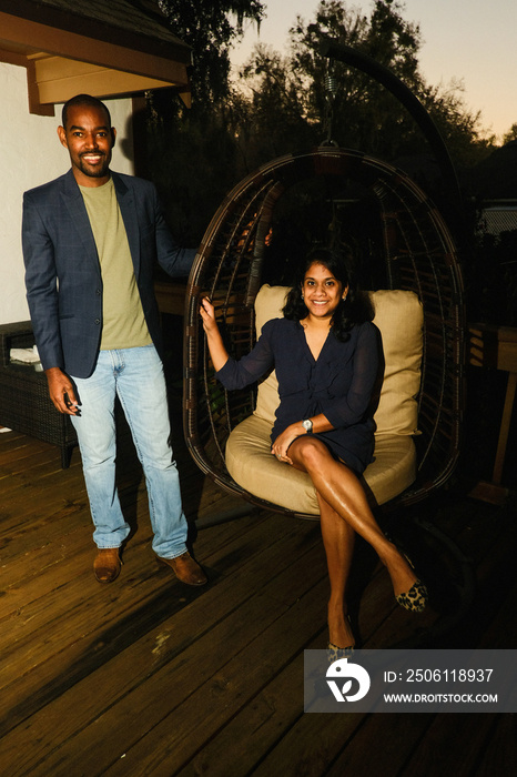 couple sitting in backyard