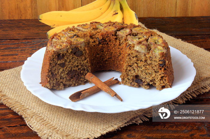 delicious healthy banana cake organic homemade, gluten free, over rustic wooden table