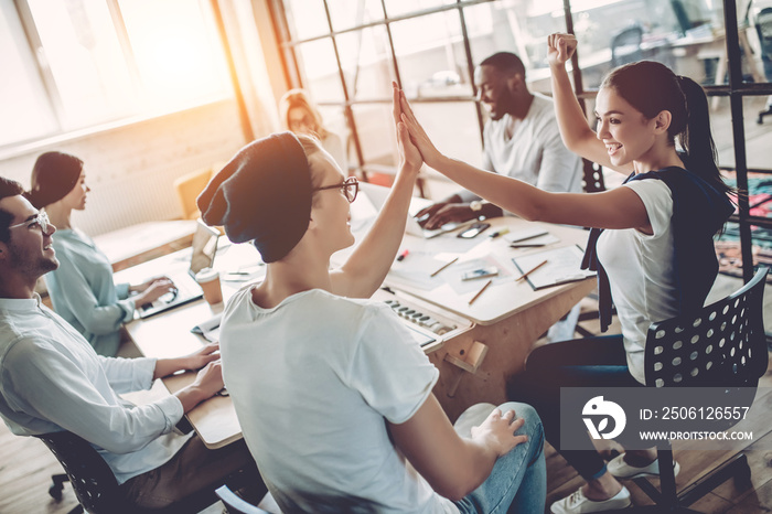 Young people work in modern office