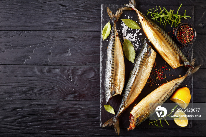 Hot smoked mackerel on a black tray