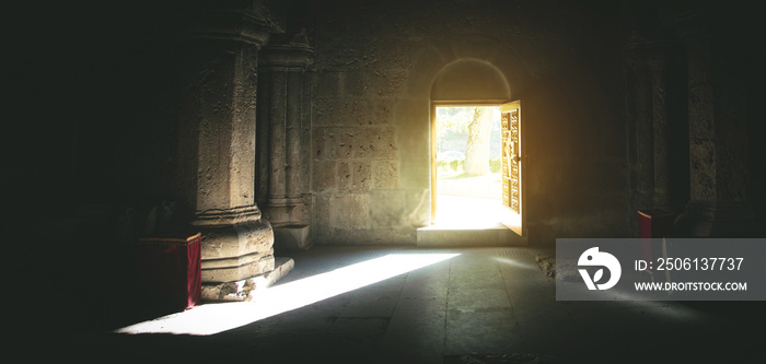 View of opened church wooden door.