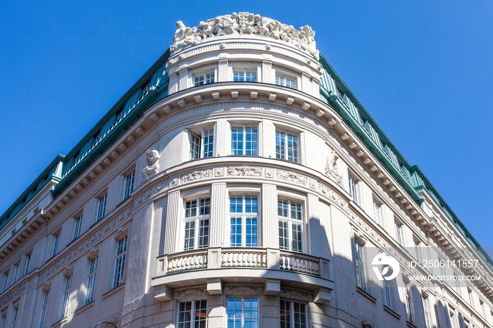 Facade of the ornate historical apartment building in the center of Vienna, Austria, Europe