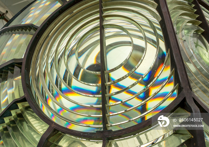 Close image of the glass prisms making up a fresnel lens in a lighthouse