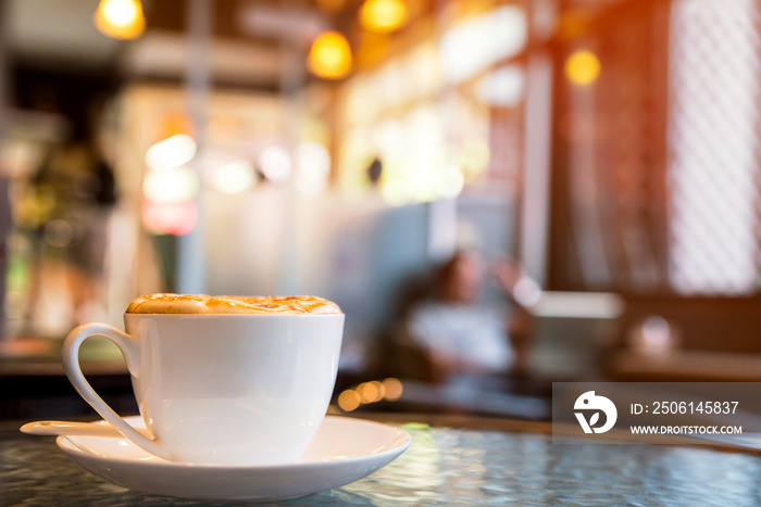 Cup of cappuccino in coffee shop