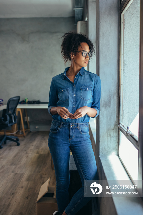 Thoughtful woman entrepreneur