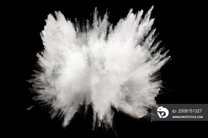 Bizarre forms of white powder explosion cloud against black background.White dust particles splash.