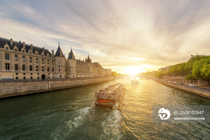 Boat tour on Seine river with sunset in Paris, France