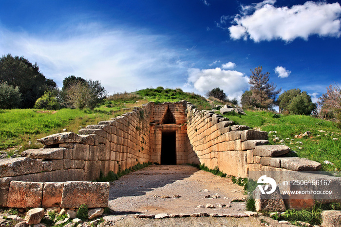 The entrance of the   Treasury of Atreus  (also known as the  Tholos tomb of Atreus  or  Tholos tomb