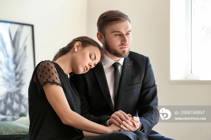 Couple pining after their relative after funeral