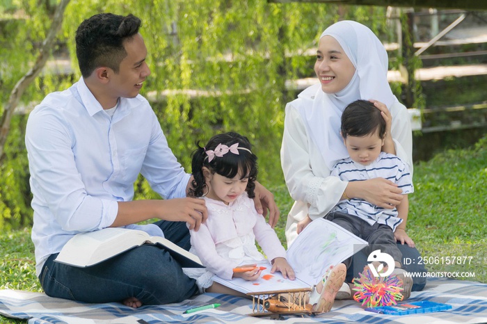 Malay family at recreational park having fun