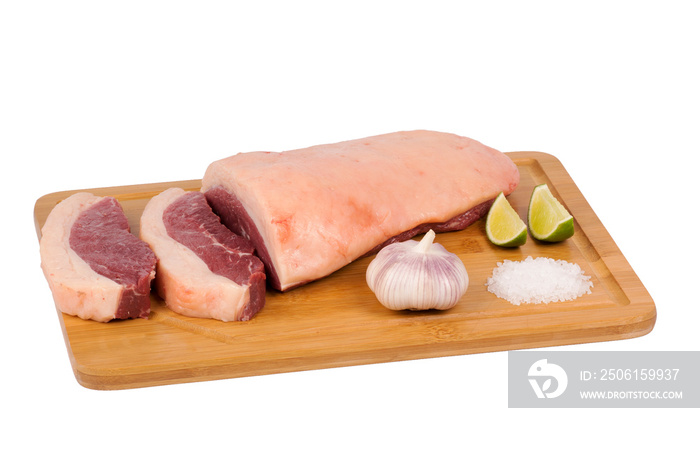 fresh and raw beef meat on cutting board on white background