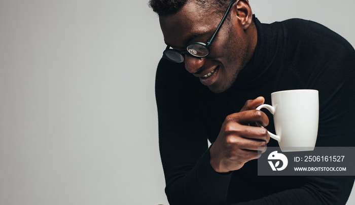 Man relaxing with a coffee