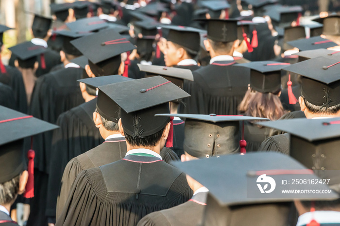 back of graduates during commencement.