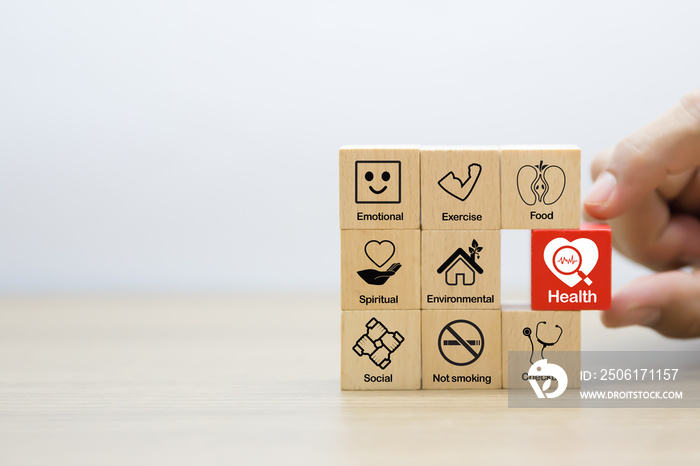 Health promotion Graphic Icon on Wooden block.