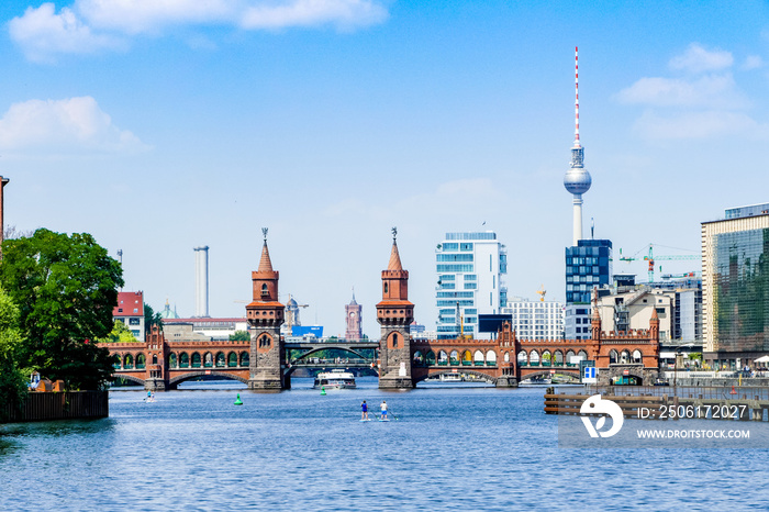 Berlin on the upper tree bridge(oberbaumbrücke) in the background  the TV tower