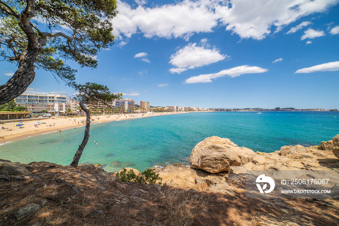 Views of the beach of Palamós with some white clouds, Girona.