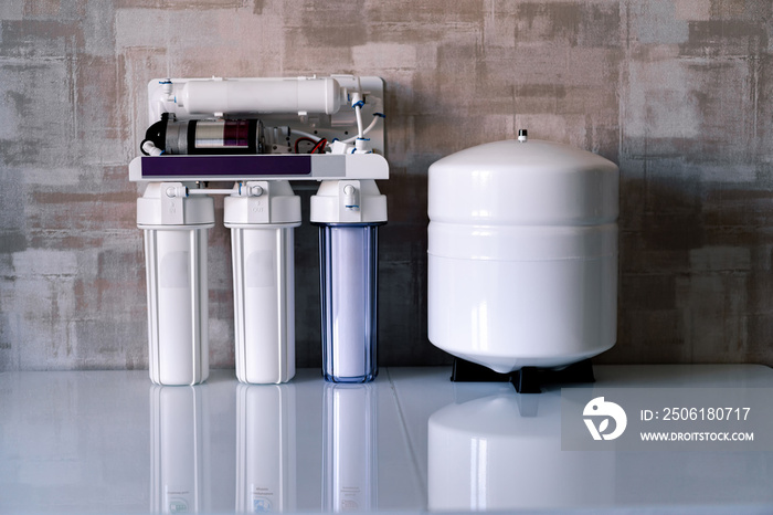 Reverse osmosis water purification system at home. Installed water purification filters. Clear water