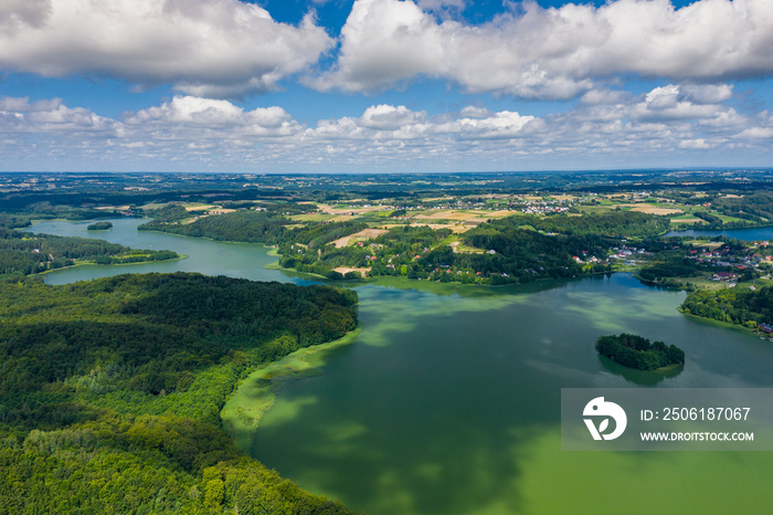 Aerial view of Kashubian Landscape Park. Kaszuby. Poland. Photo made by drone from above. Bird eye v