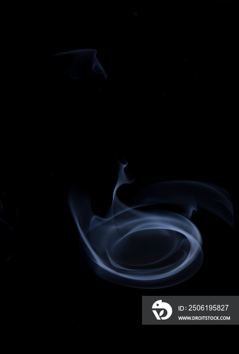 The movement of smoke on a black background, abstract smoke background on a black background