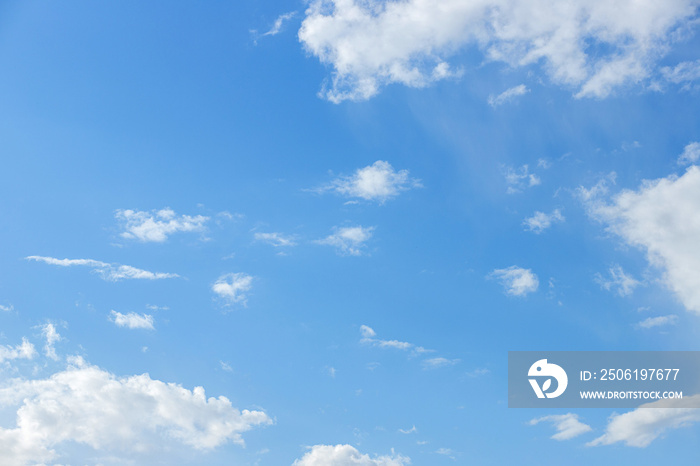 Beautiful blue clouds in the sky. Blue sky background.