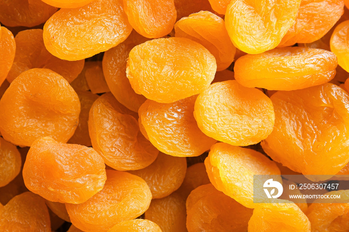 Tasty dried apricots as background