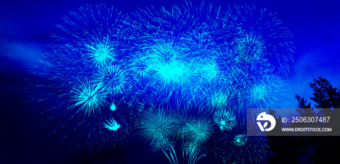 New Year celebration fireworks with blue color for text.Banner background.Festive, Festival, Celebra