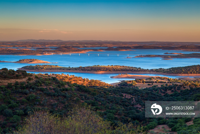 Portugal, Monsaraz. View from the fortress walls to Guadiana river at sunset.