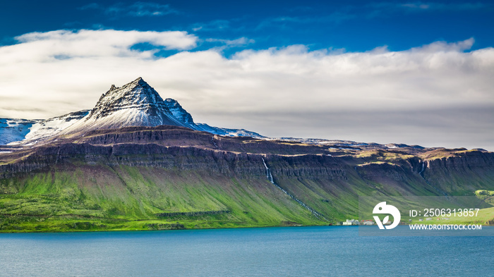 Volcanic mountain over fjord, Iceland