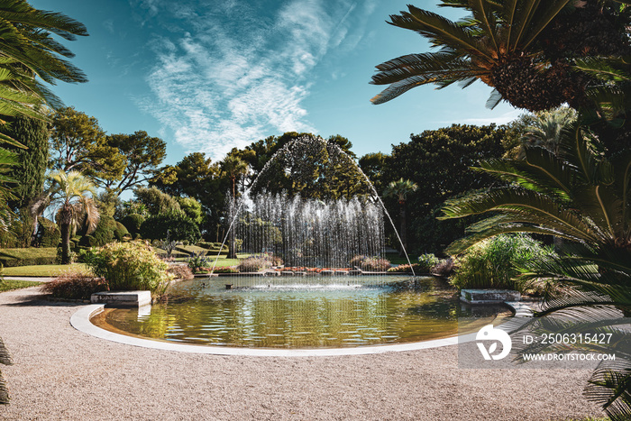 A beautiful garden fountain of Villa Ephrussi de Rothschild in a sunny day