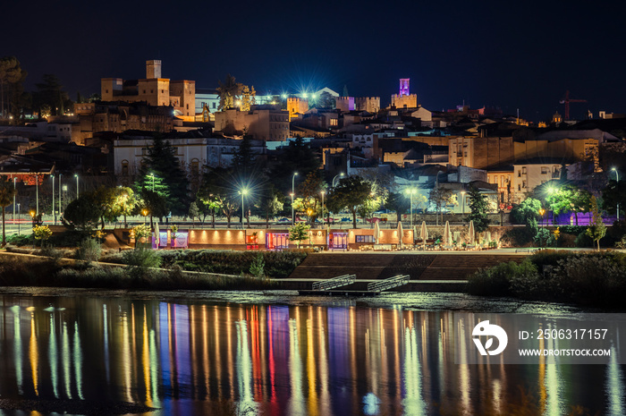 Reflection of lights on the river in the city, reflections in the river city of badajoz