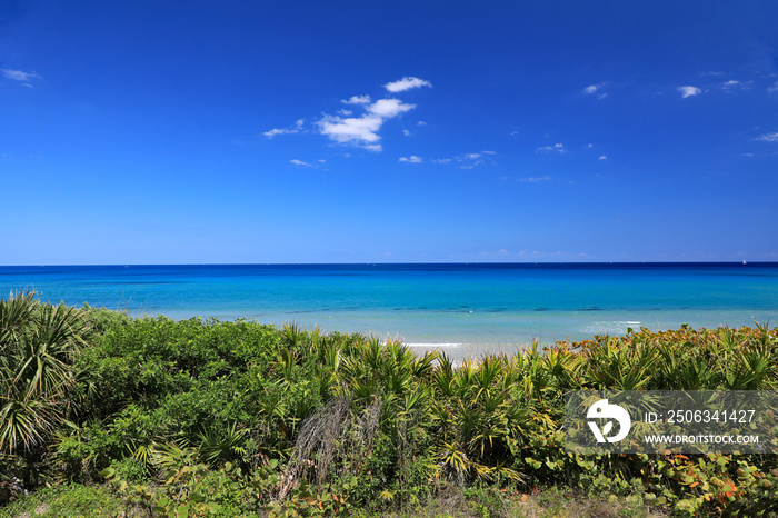 Beautiful view of the Atlantic Ocean with shades of blue and turquoise off Singer Island, Florida, n