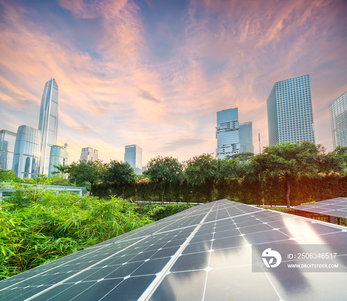 Solar Panel Photovoltaic installation with urban landscape landmarks, alternative electricity source