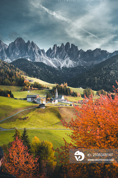 Beautiful autumn colors at the foot of the Odle Mountains in the backdrop of the Seceda Mountains at