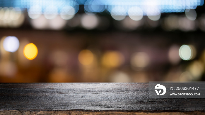 Empty wooden table platform and bokeh at night