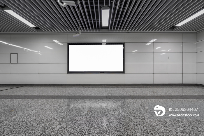 Blank billboard in metro station