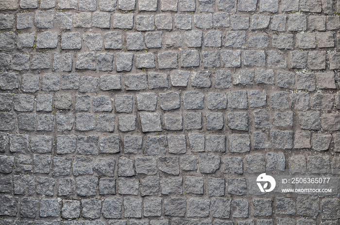 Old road paved with granite stones