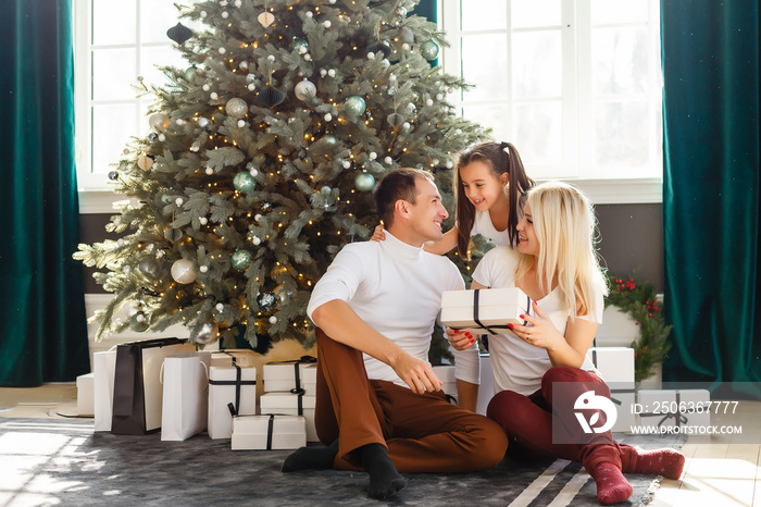 happy family with christmas gift