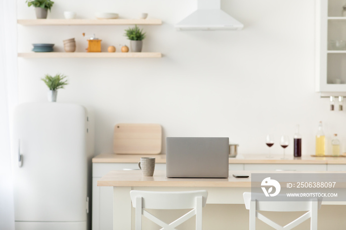 Simple interior, home office in kitchen during covid-19 quarantine