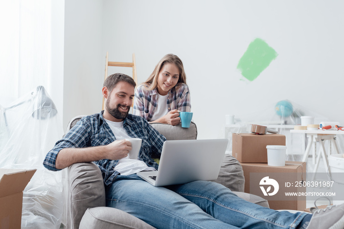 Couple relaxing during home renovation