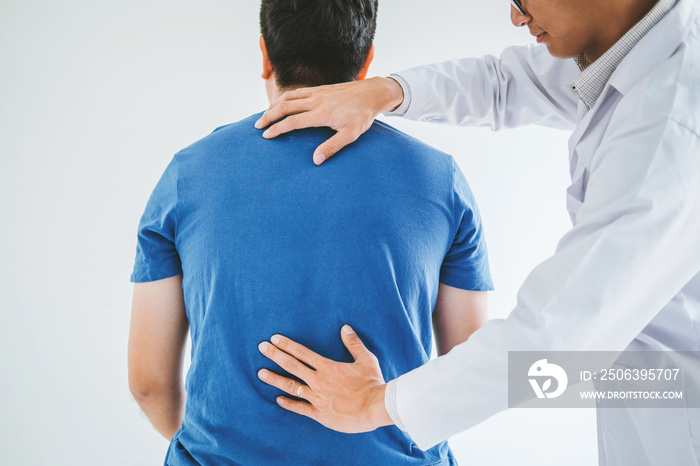 Physical Doctor consulting with patient about Back problems Physical therapy concept