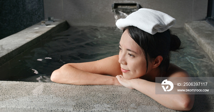 Woman enjoy the japanese hot springs