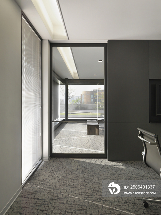 Doorway and carpeted area in modern office