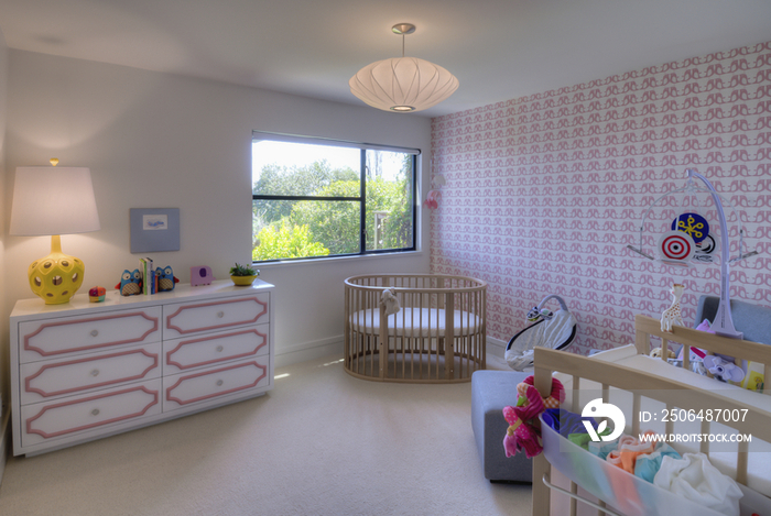 Wooden cradle and cabinet on childs bedroom; San Francisco; California; USA