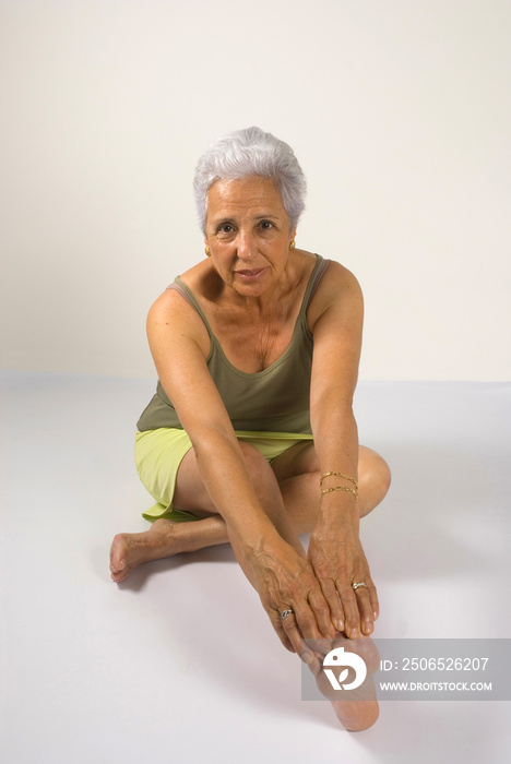 Mature woman exercising