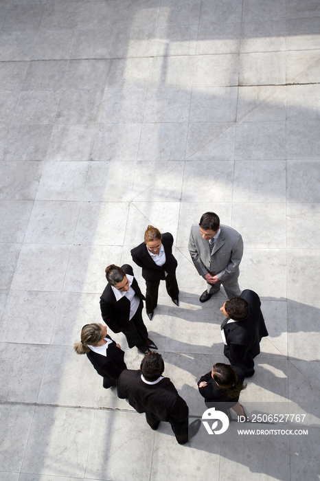 Business team stood in a circle