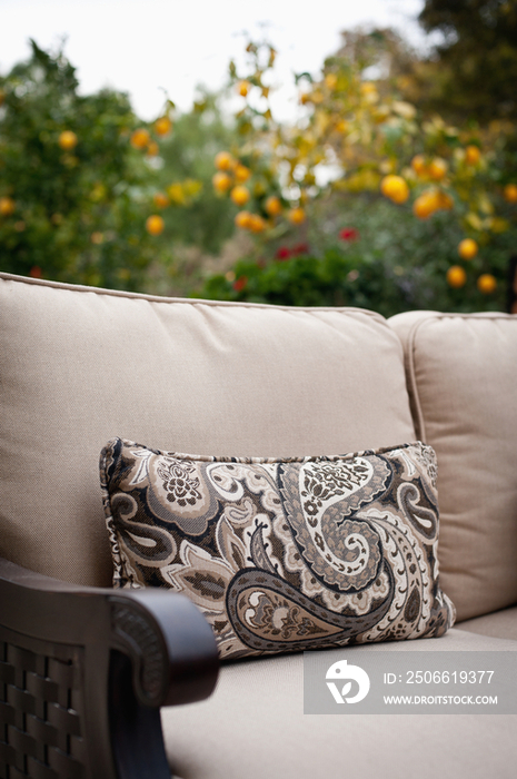 Cropped couch at patio against blurred plants; Rancho Sante Fe; USA